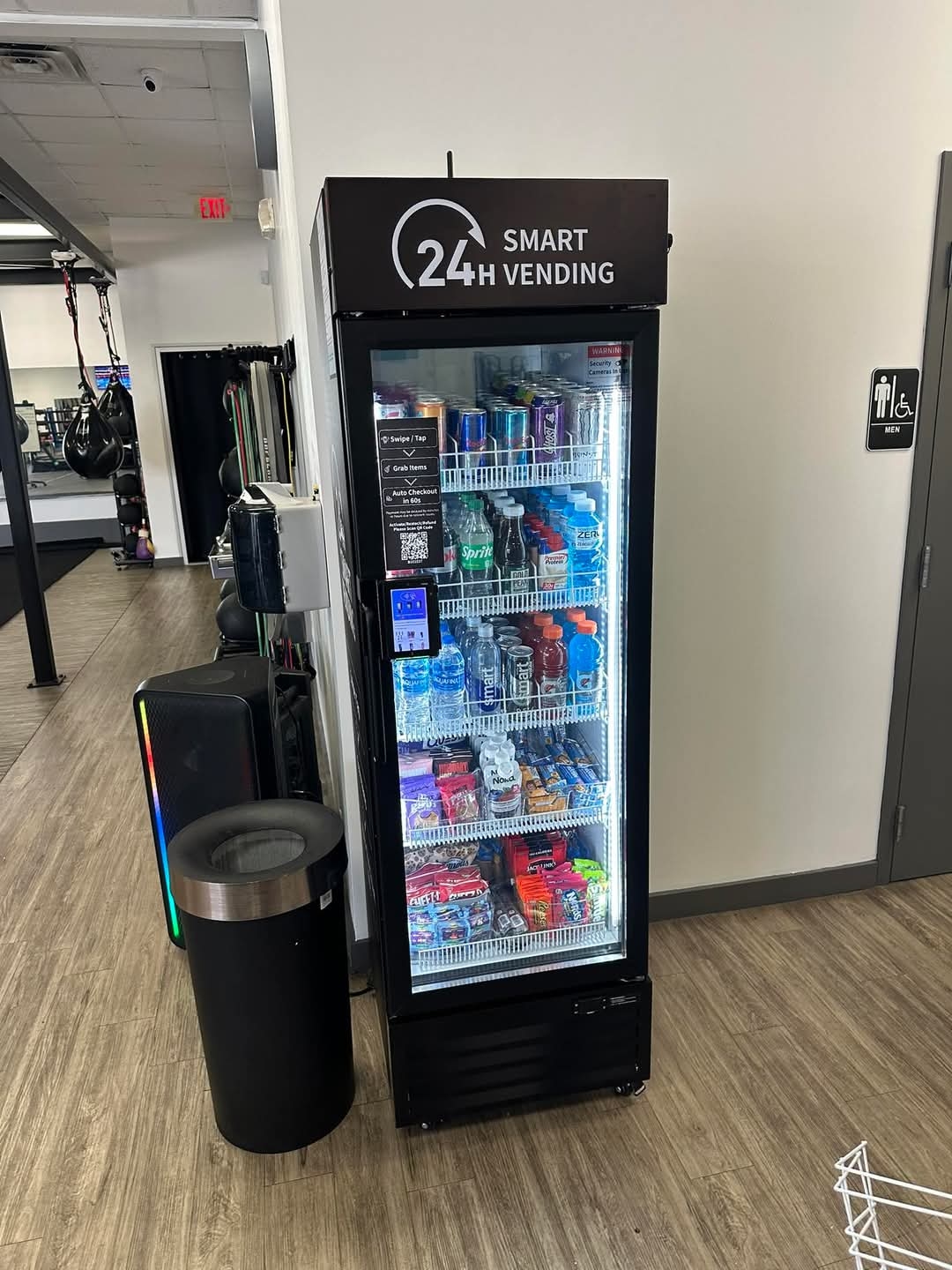 Single-door smart vending cooler in a gym