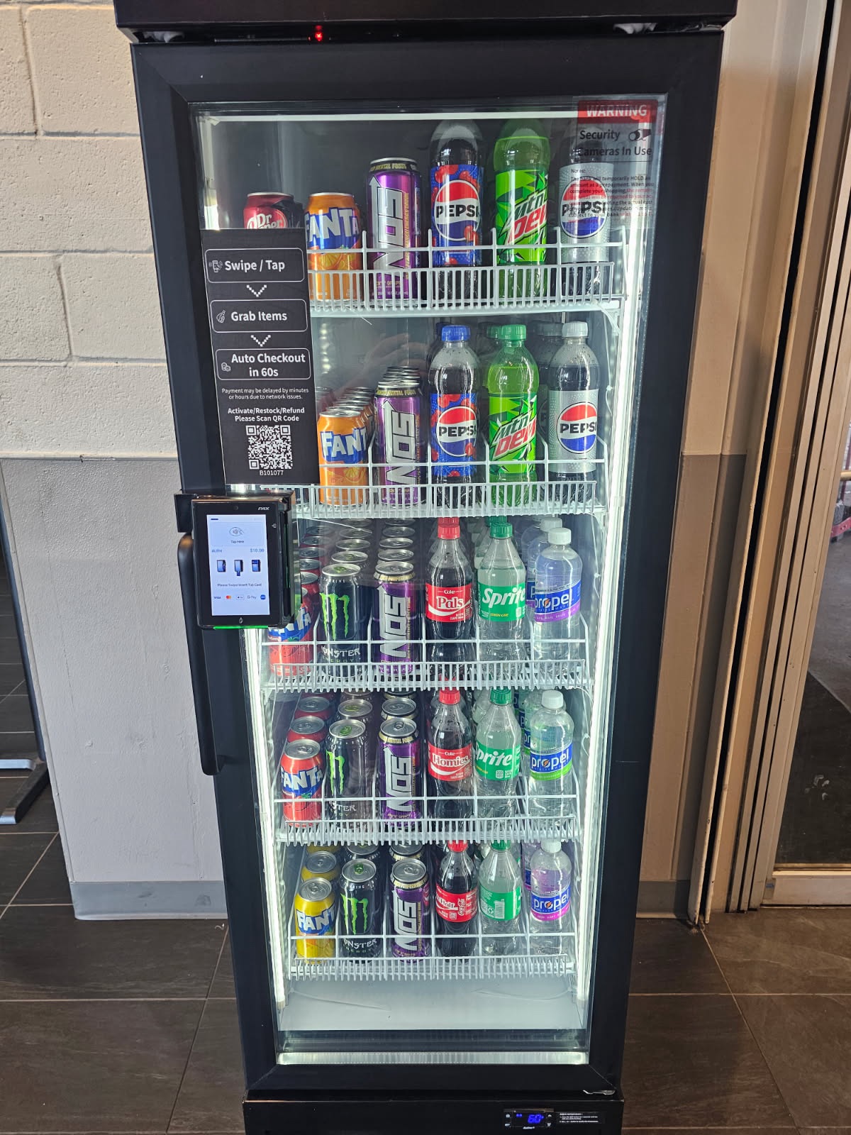 Smart vending cooler showing card reader and QR code